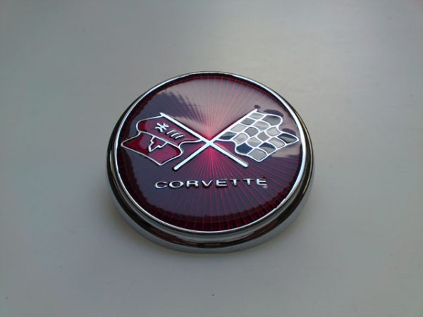 75--76 Emblem , Front "Surburst"